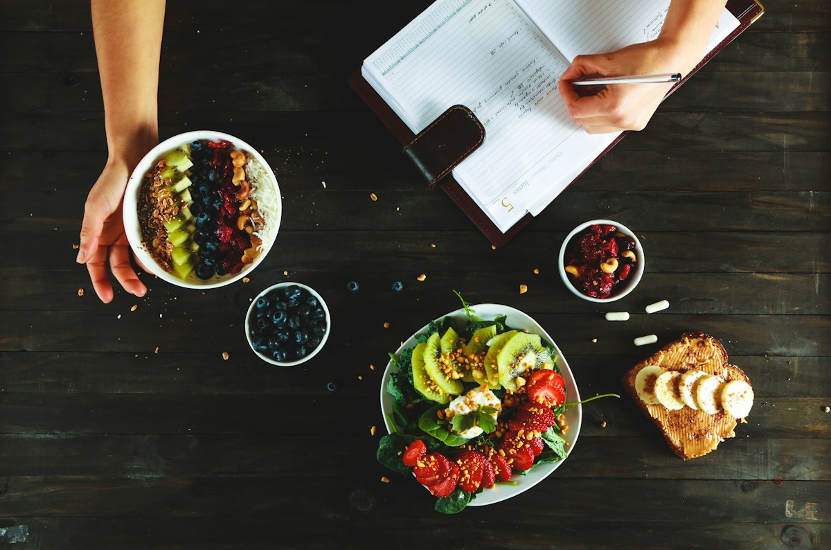 Balanced meal preparation with fresh vegetables and nutritious foods